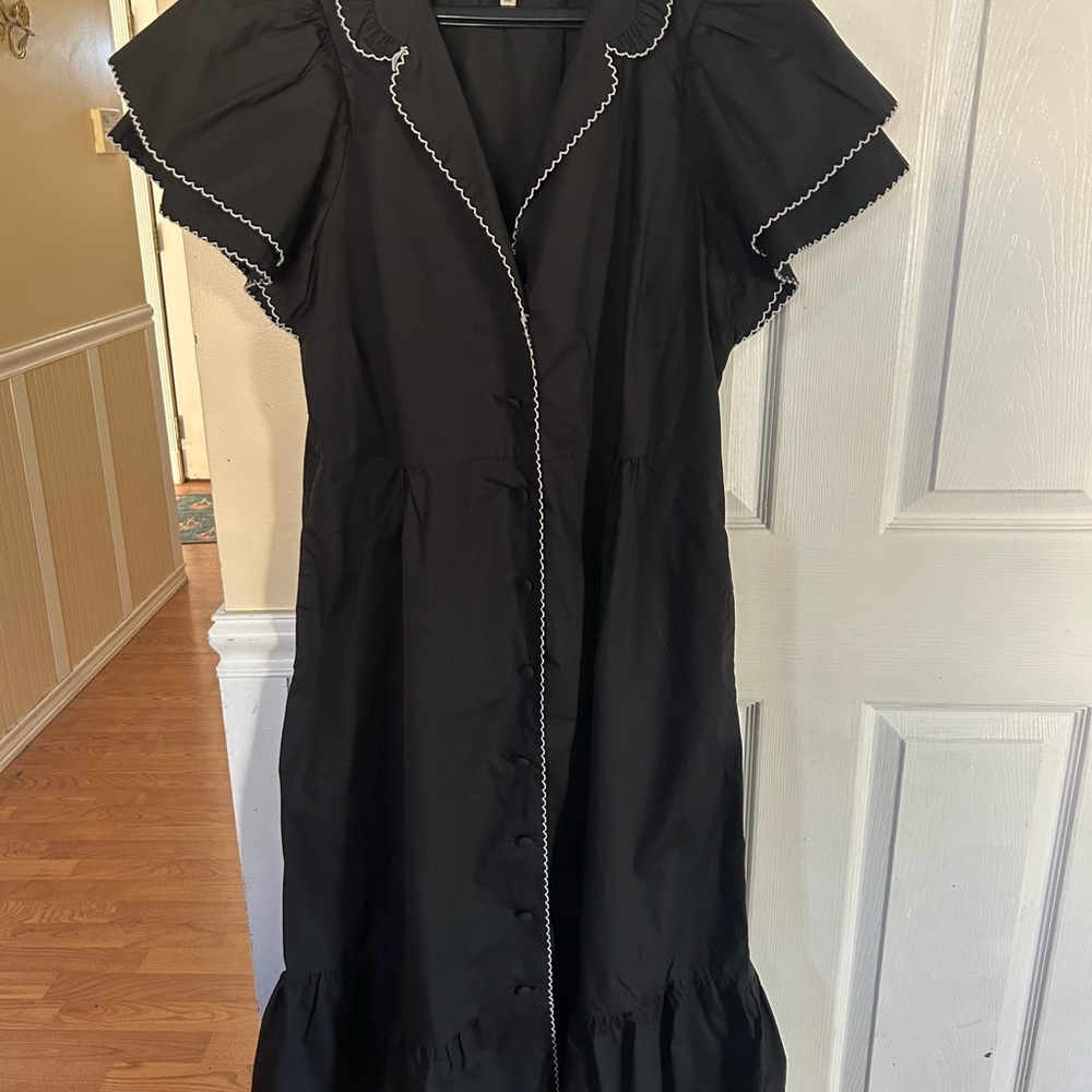Tuckernuck Alice Dress is a black, elevated midi dress. - Picture 6 of 10
